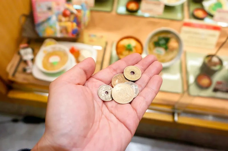 A Tourist Tries to Tip in Japan