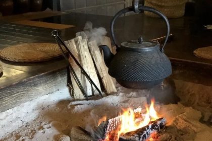 A Kettle Over a Flame in a Traditional Irori Hearth