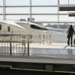 Bedah Tuntas JR Rail Pass: Siapa yang Untung Membelinya? 12 A JR Rail Pass Holder Boards the Shinkansen at Kyoto Station