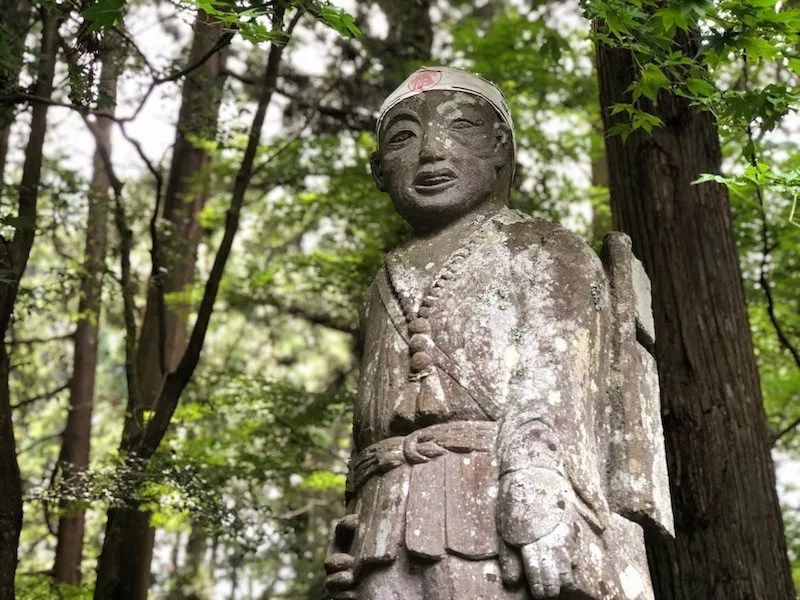 A Statue of a Mt. Fuji Climber at Kitaguchi Hongu Fuji Sengen Shrine